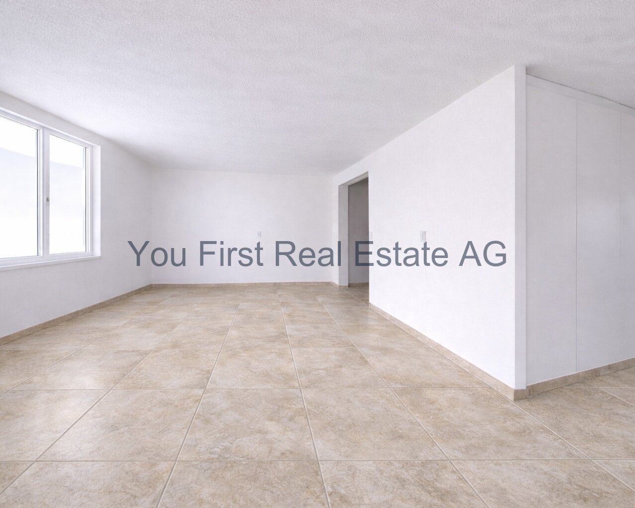 Stilvoll renovierte 3.5-Zimmerwohnung im Erstbezug mit Balkon und Garage