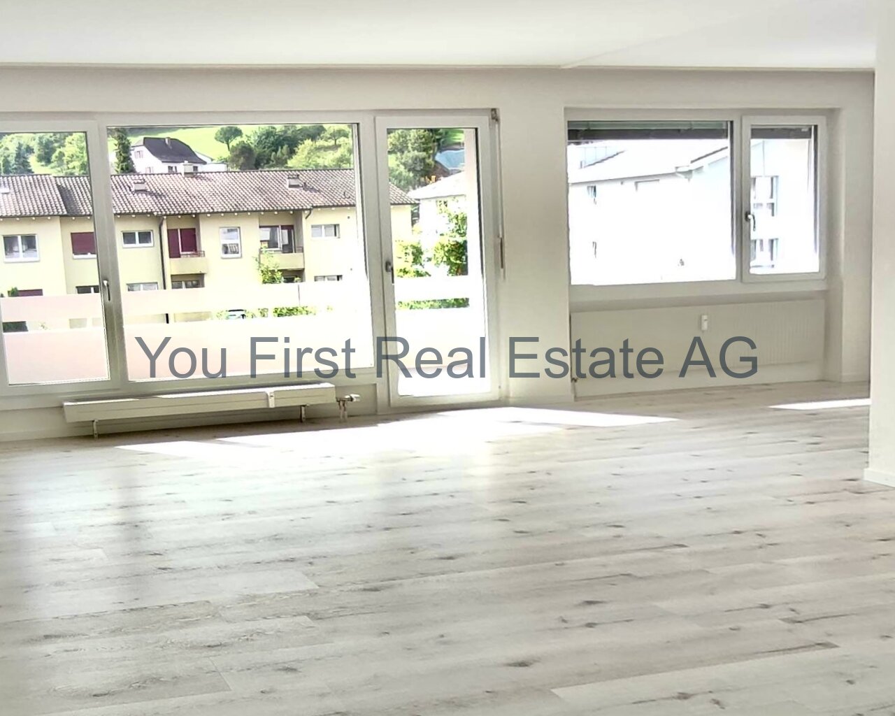 Top Attikawohnung mit grossem Balkon