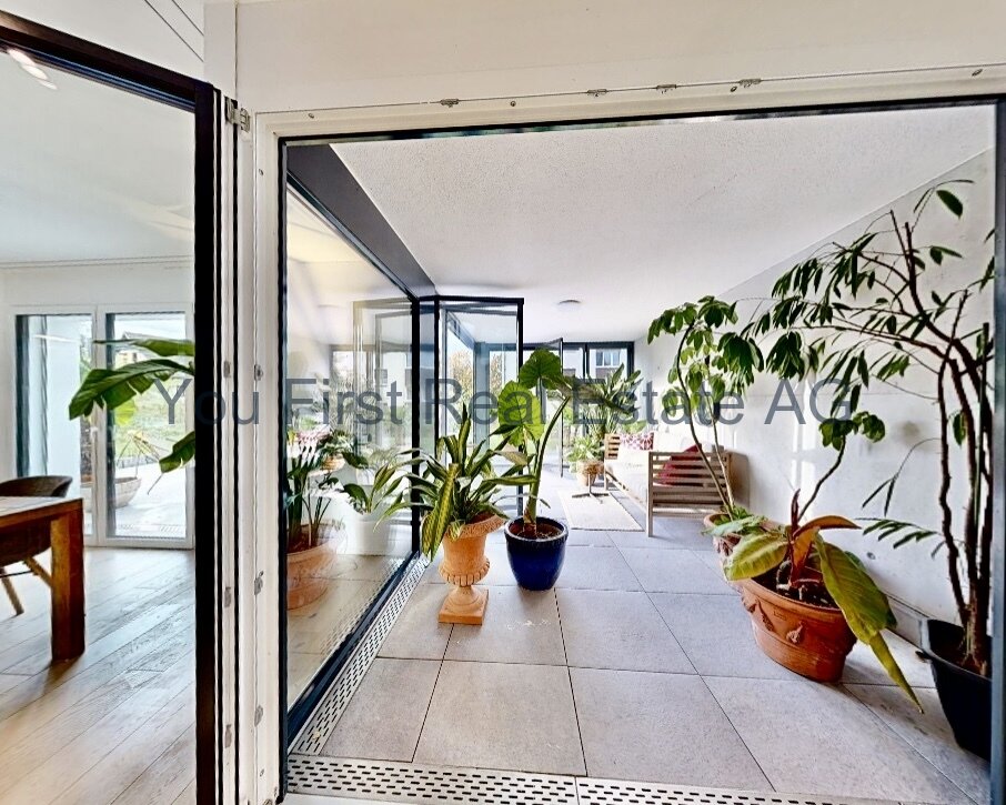 Gartenwohnung mit exklusiven Wintergarten