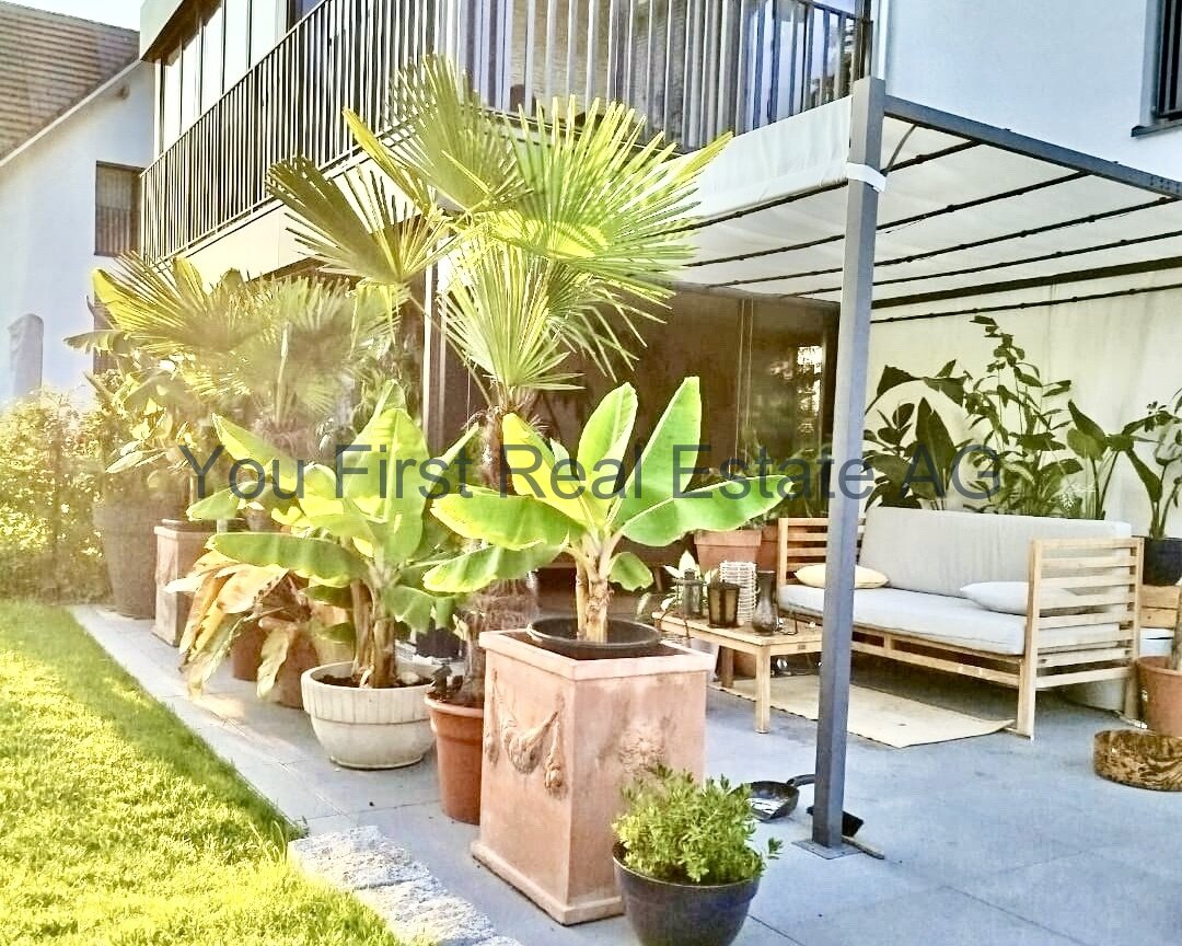 Gartenwohnung mit exklusiven Wintergarten