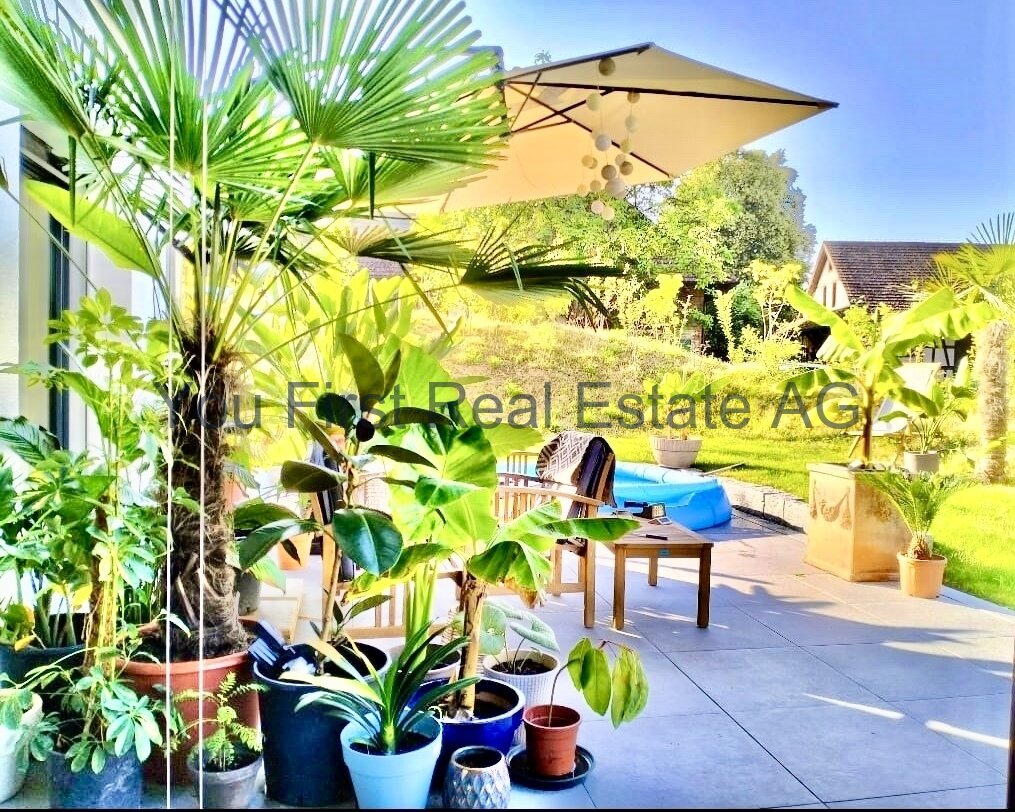 Gartenwohnung mit exklusiven Wintergarten