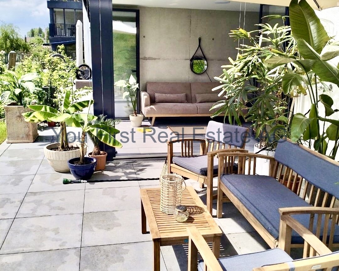 Gartenwohnung mit exklusiven Wintergarten