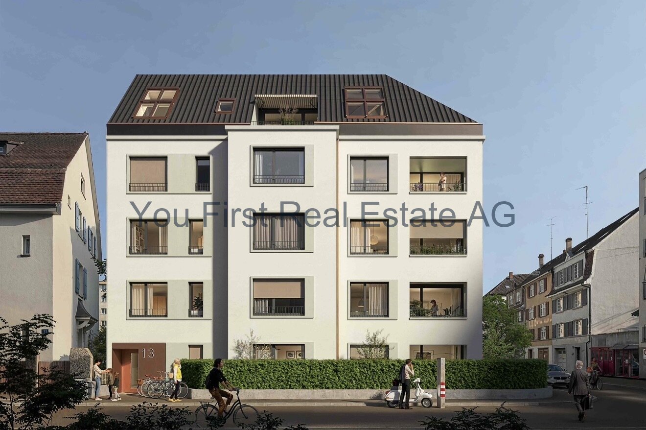 Modernes Mehrfamilienhaus mit intelligenter Fassadengliederung und durchgehenden Balkonzonen