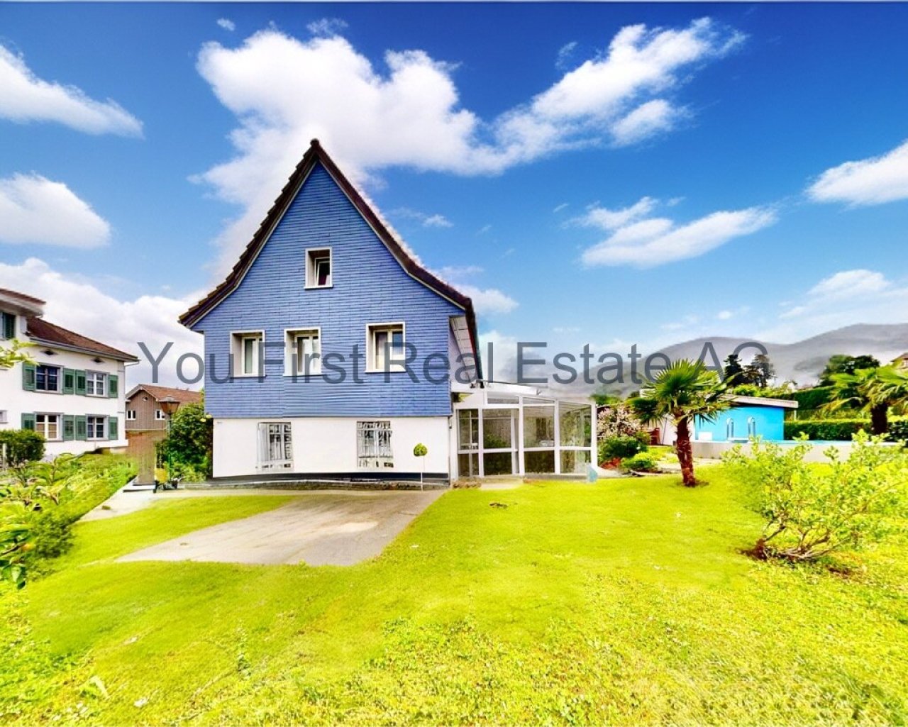 Lichtdurchflutetes Einfamilienhaus mit Wintergarten und traumhaftem Garten in idyllischer Lage