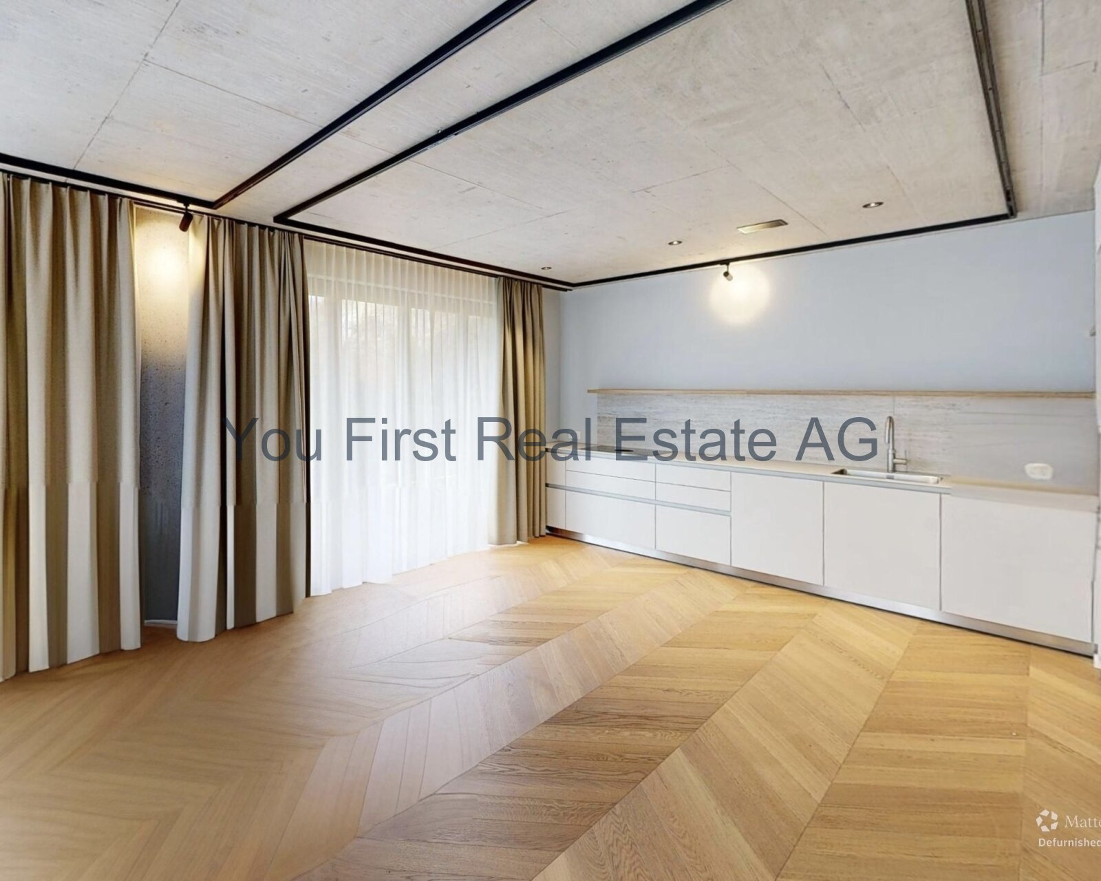 Exklusive Designerküche mit Fischgrät-Parkett und eleganter Lichtführung