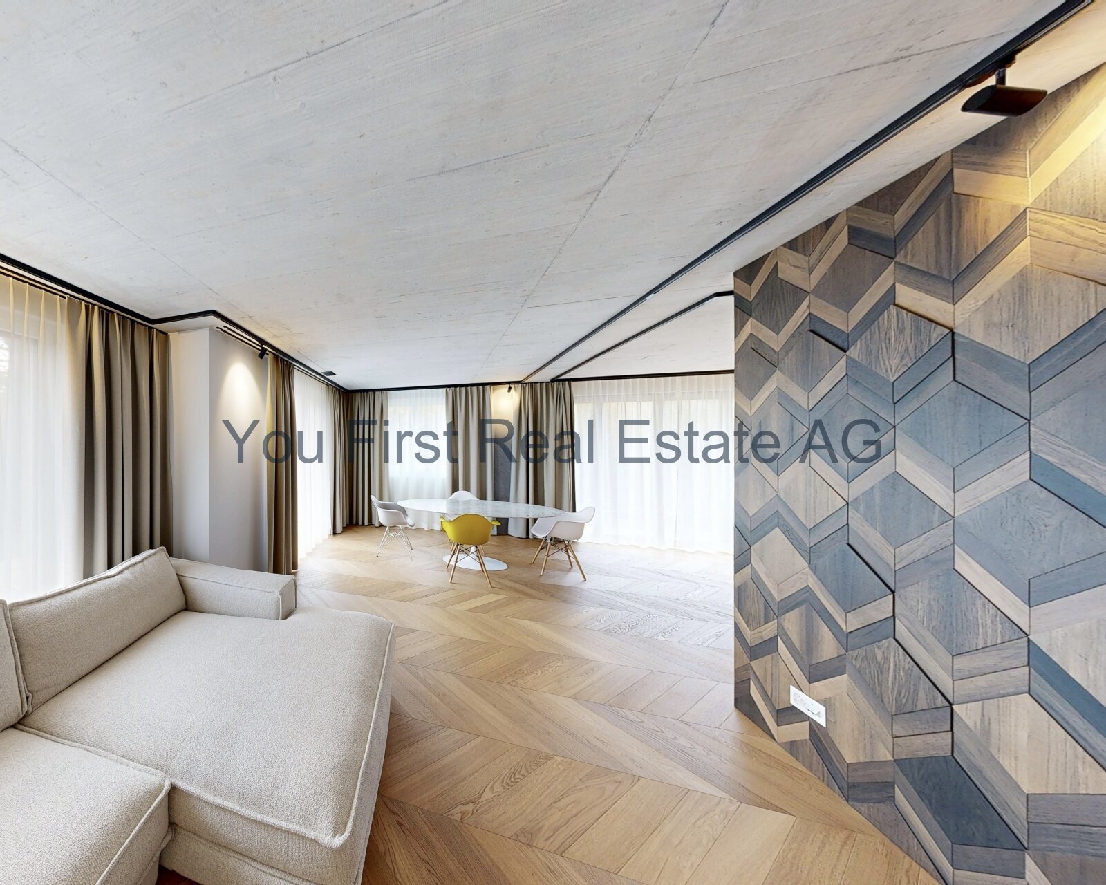 Designwohnung mit Fischgrät-Parkett und moderner Wandgestaltung - Lichtdurchfluteter Wohnbereich mit elegantem Raumkonzept